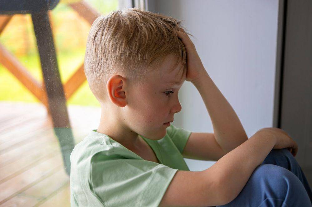 Close up on sad boy portrait