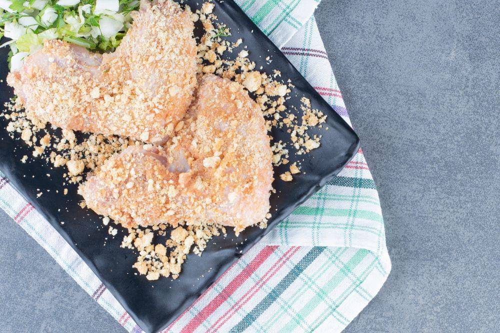 Chicken on black plate