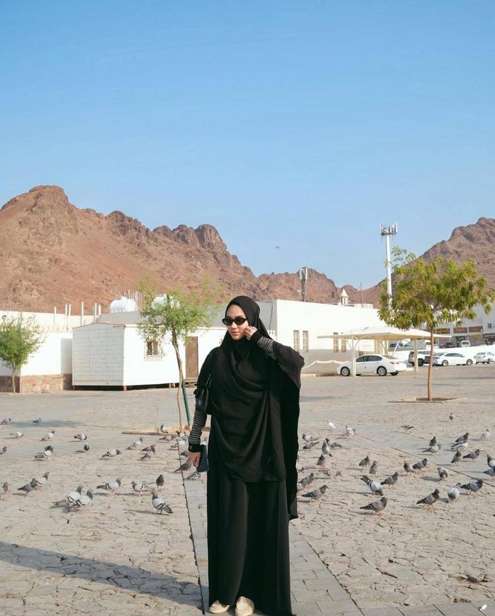 Penampilan Zize saat liburan