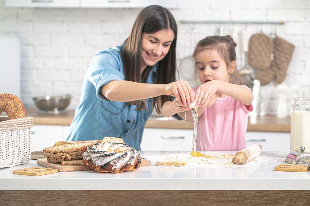 mom and daughter prepare pastries