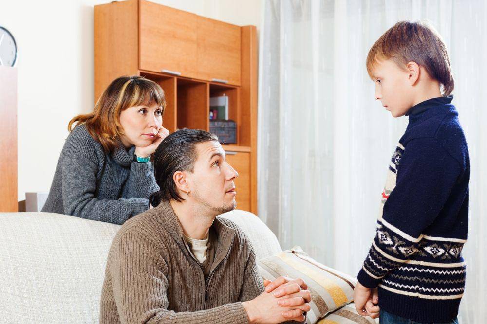 Ordinary parents berating teenager son