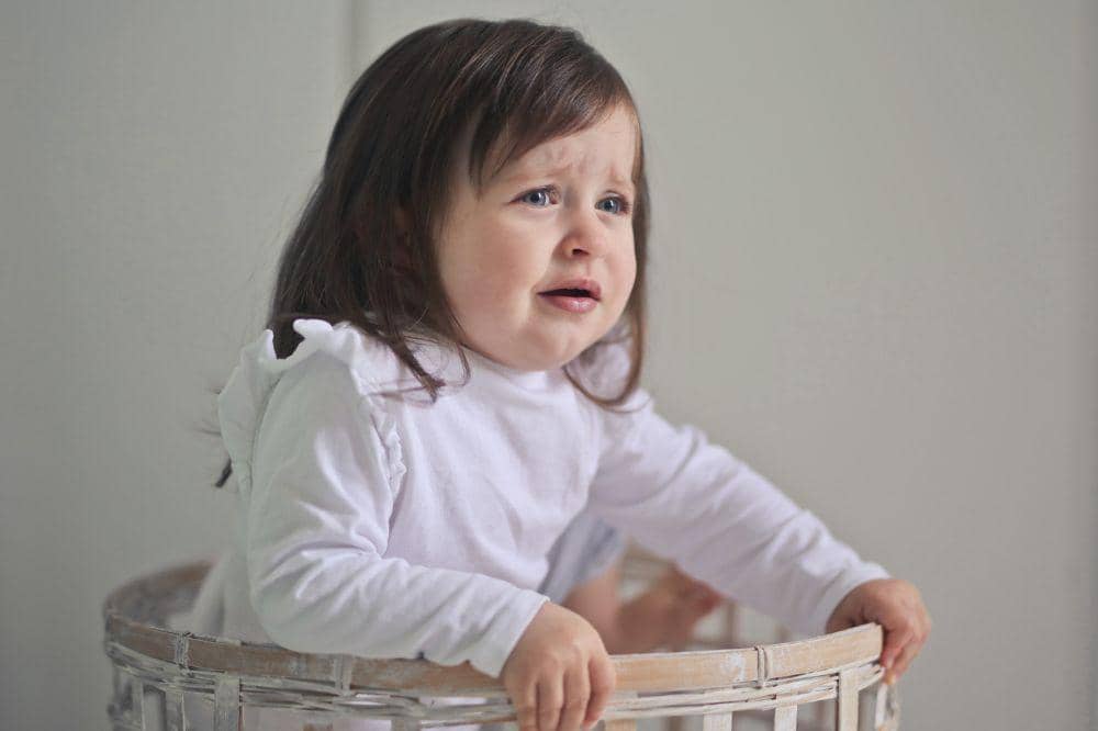 Baby girl in the walker crying.jpg