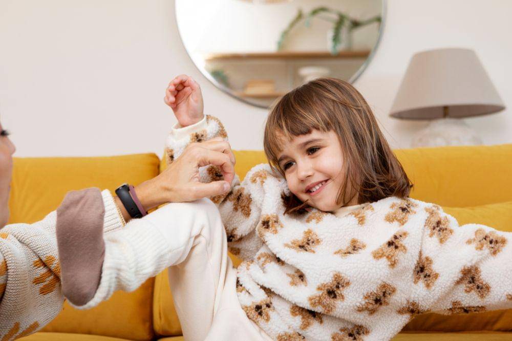 Kid having fun in her room