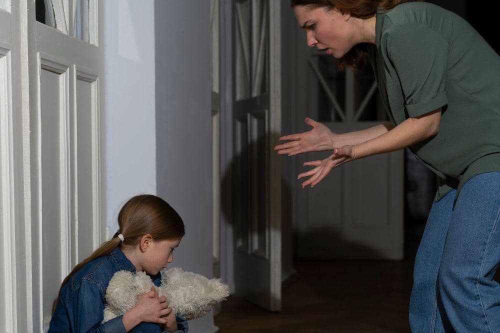 child suffering from abuse by parent