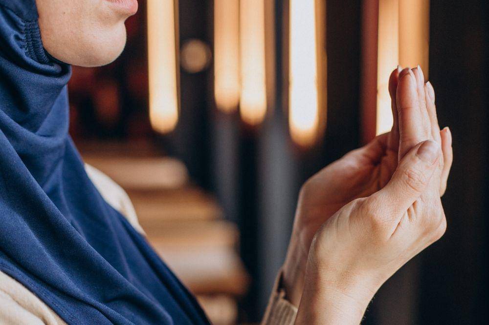 Muslim woman praying