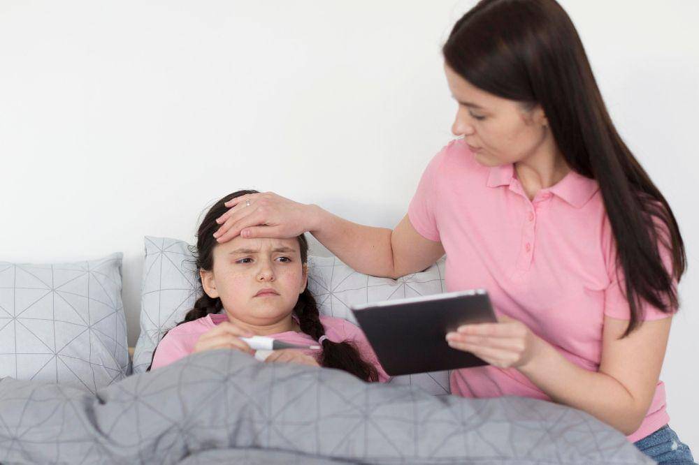 Little girl having fever