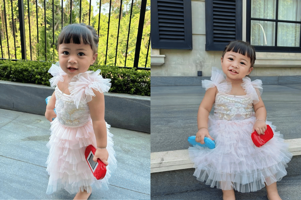 Ranaima mengenakan dress