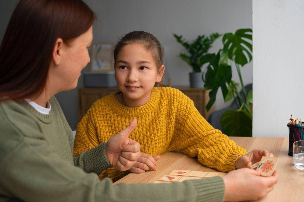 mother telling her daughter