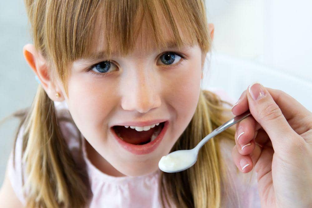 kid drink her probiotics