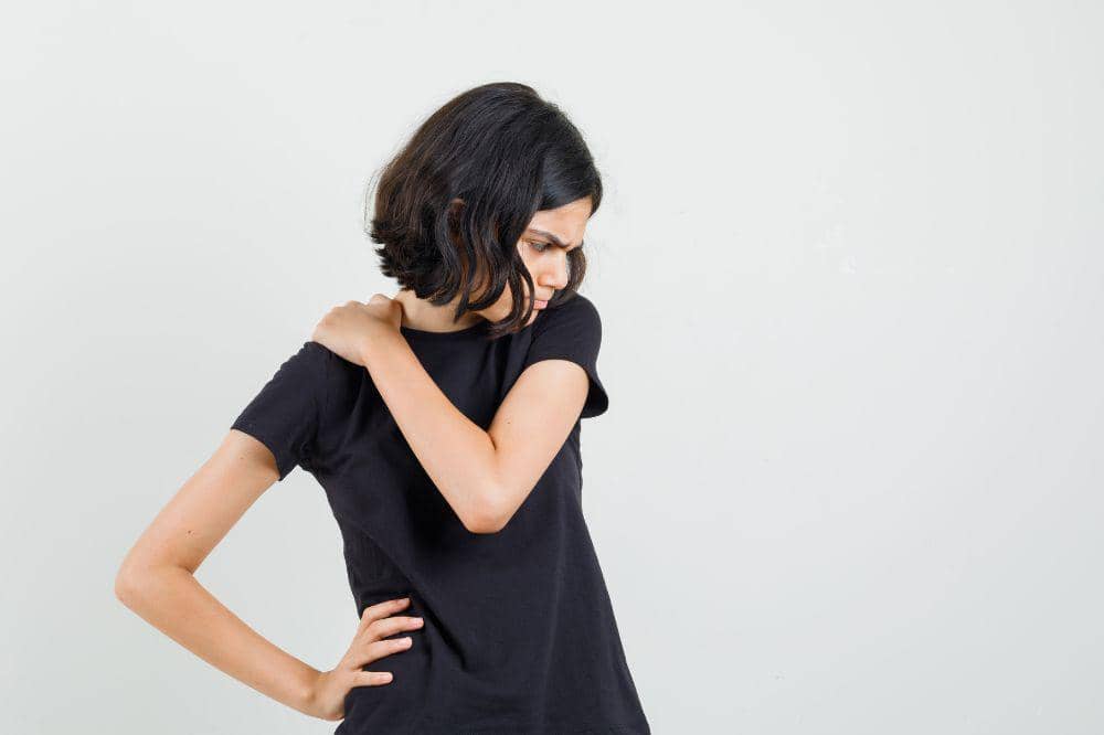 Little girl having neck pain