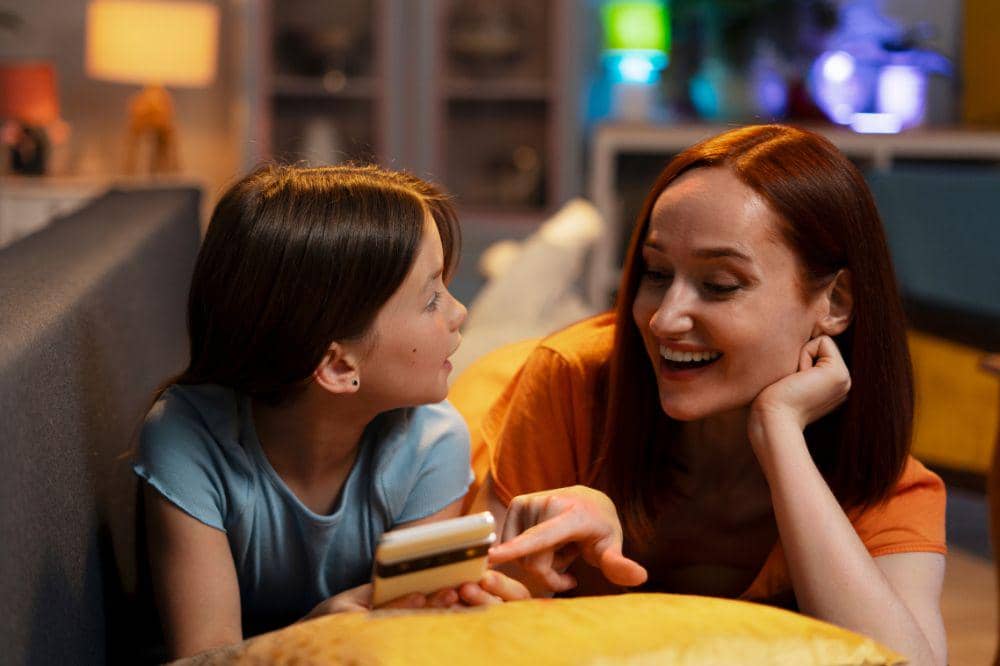 Front view woman and kid relaxing at home