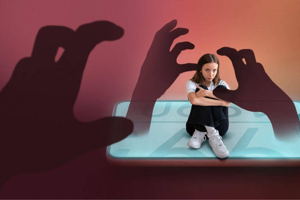 Teenager being cyberbullied on smartphone