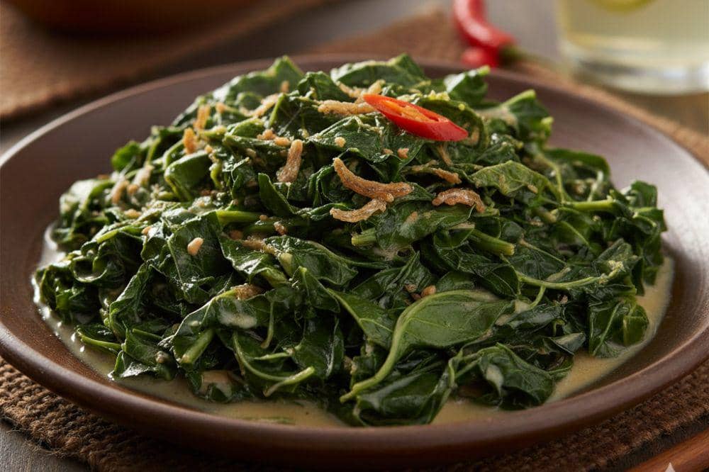 7 Kumpulan Resep Tumis Daun Singkong, Lauk Sederhana yang Bikin Nagih