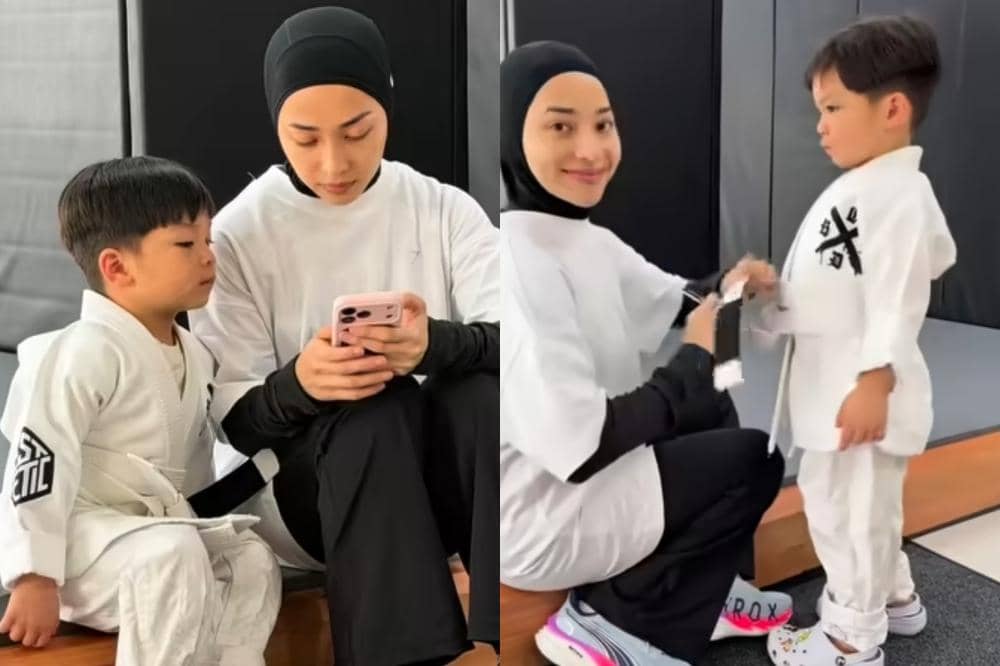 Nikita Willy membantu Issa memakai Gi Jiu Jitsu