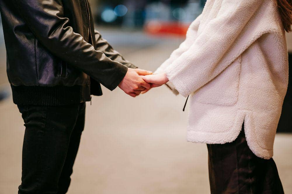 couple holding hands
