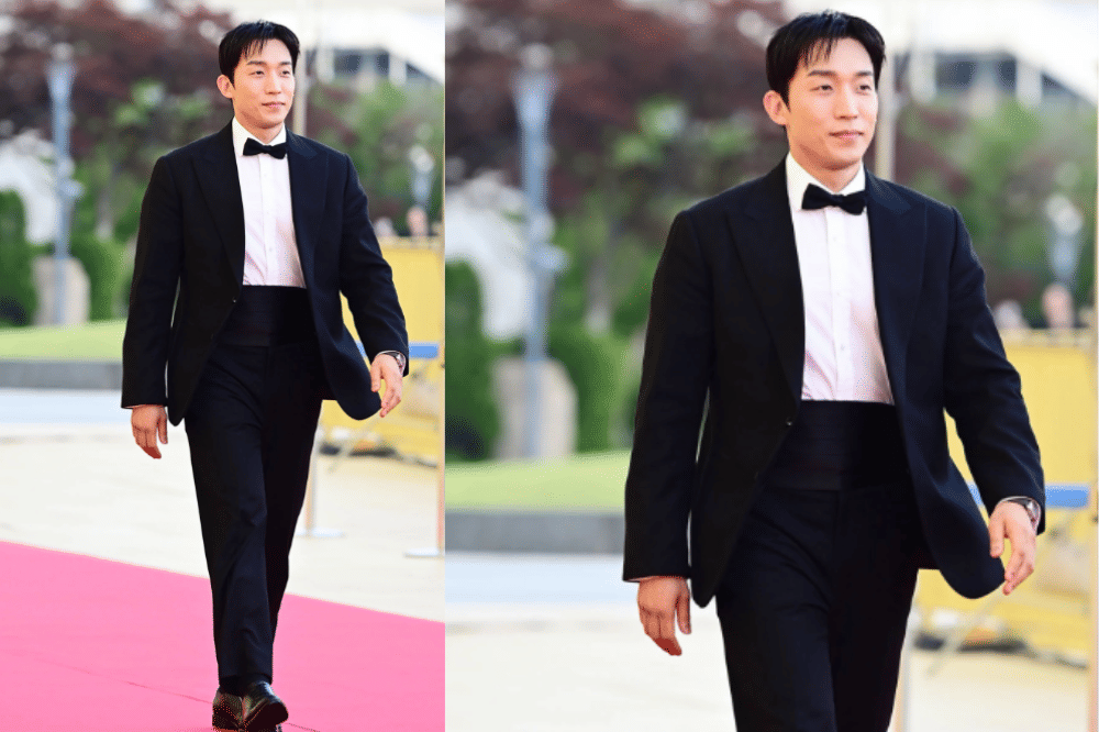 Lee Sang Yi elegan dengan tuksedo hitam beraksen sabuk pinggang