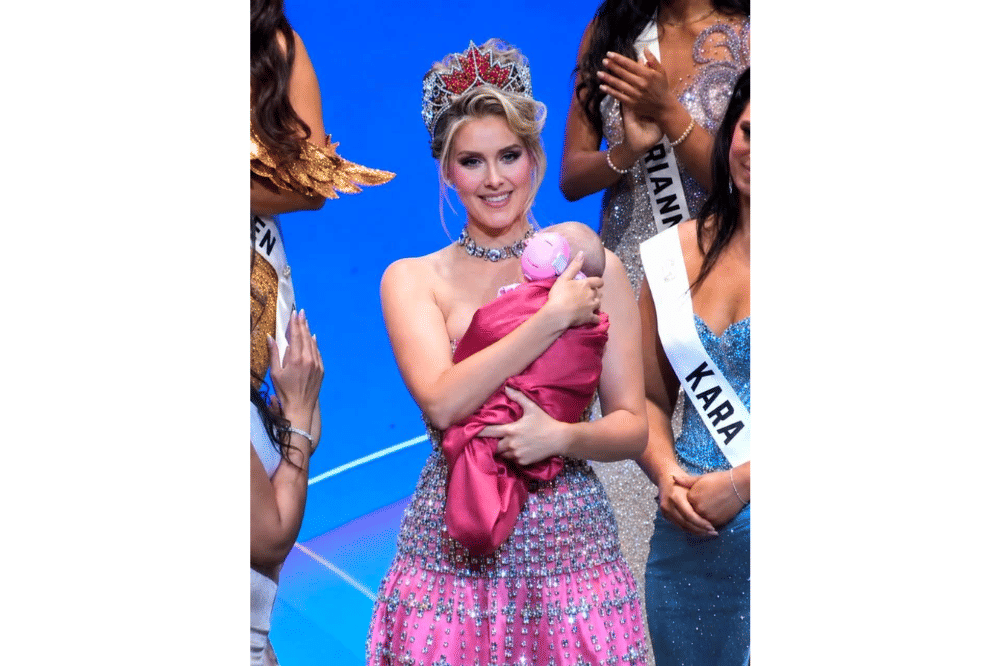 Miss Universe Canada gendong bayi saat final walk